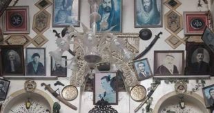 منزل نزار قباني بدمشق يتحول إلى معرض لصور ذوي العمائم السوداء وبشار